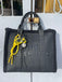 Borsa The Tote Bag Mua Collection con Charms