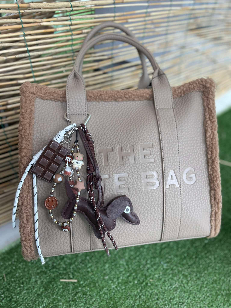 Borsa The Tote Bag Mua Collection con Charms